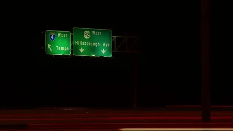 TIme Lapse of Tampa Exit Sign on I-4 Stock Footage 72875968