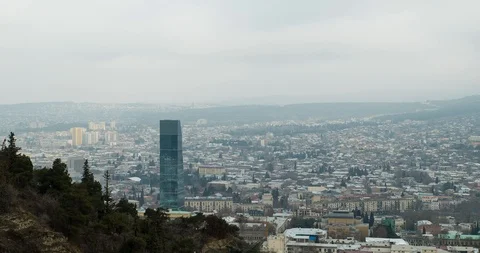 Time lapse of Tbilisi. Skyscraper. Forest. Clouds Stock Footage 103086378