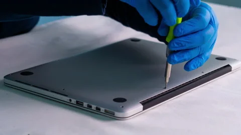 Time lapse of technician opens a laptop for clean. Close up of male hands or  Video stock 151257472