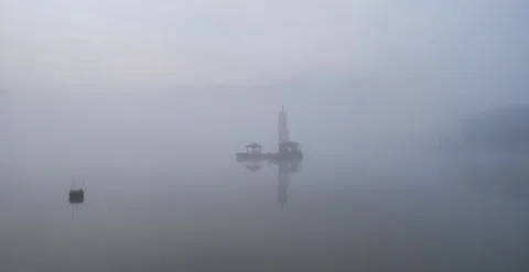 Time Lapse of Thick Fog Lake Central Boat Flow Fog Mist Video stock 337943008