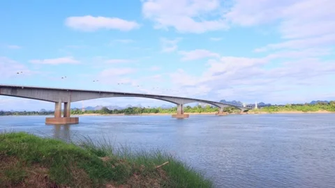 Time lapse of Third Thai-Lao Friendship Bridge with clear blue sky Stock Footage 143956003