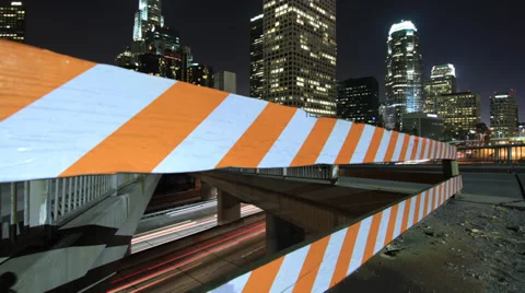 Time Lapse Through Construction Barrier Reveals Downtown LA Stock Footage 35108897