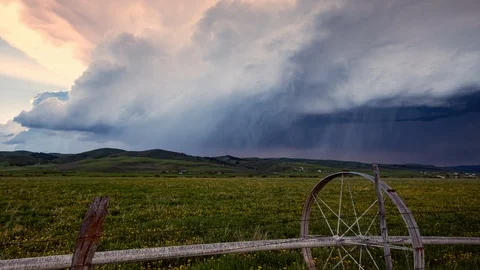 Time lapse of thunder storm rolling through the sky over field Stock Footage 90421566