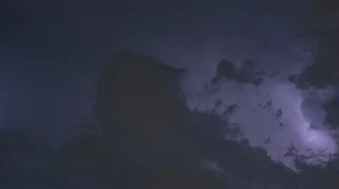 Time lapse of Thunderstorm clouds at night with lightning Stock Footage 65235018