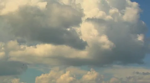 Time-lapse thunderstorms building then dissipating revealing blue sky Stock Footage 10832740