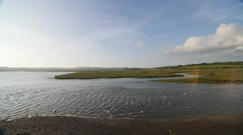 Time Lapse of tide coming in on estuary Stock-Footage 65062328