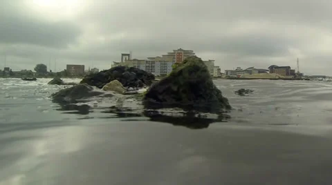 Time lapse tide going out rocks in foreground 02 Stock Footage 33899083