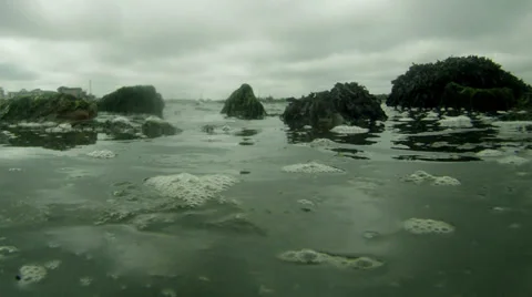 Time lapse tide going out rather dull day 02a Stock Footage 33899106