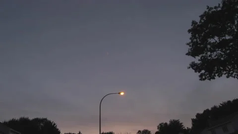 Time lapse tilt down of suburban sunset Stock Footage 169273207