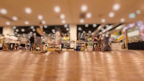 Time lapse Tilt-shift blur of super market with people walking to shop. Stock Footage 115258213