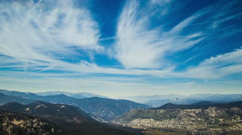 Time Lapse - Time Lapse - Beautiful Clouds Moving Over Mountain Ranges Stock Footage 54752998
