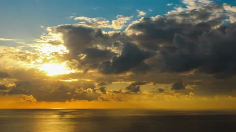 Time lapse timelapse of clouds crossing the sky at sunset Stock Footage 65174949