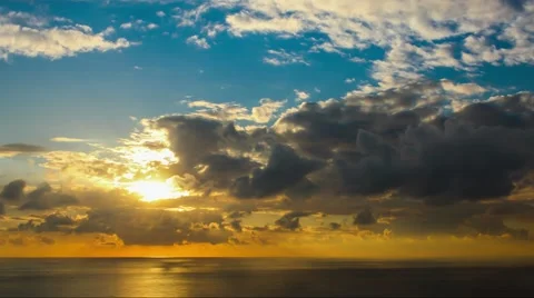 Time lapse timelapse of clouds crossing the sky at sunset Stock Footage 65174950