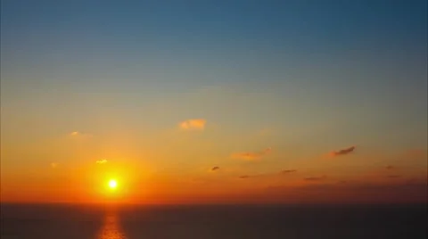 Time lapse timelapse of clouds crossing the sky at sunset Stock Footage 65174963