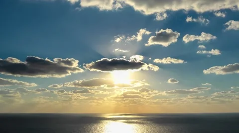 Time lapse timelapse of clouds crossing the sky at sunset Stock Footage 65174976