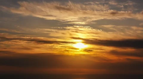 Time lapse timelapse of clouds crossing the sky at sunset Stock Footage 65174992