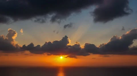 Time lapse timelapse of clouds crossing the sky at sunset Stock Footage 65175024