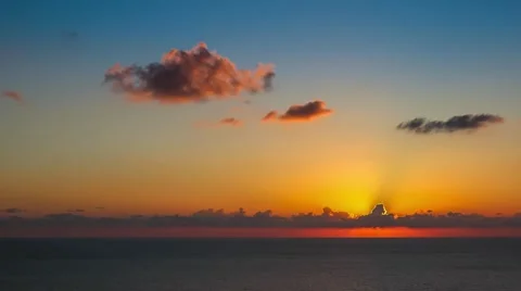 Time lapse timelapse of clouds crossing the sky at sunset Stock Footage 65175041