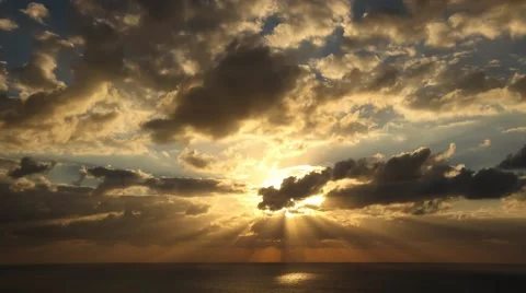 Time lapse timelapse of clouds crossing the sky at sunset Stock Footage