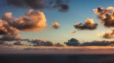 Time lapse timelapse of clouds crossing the sky at sunset Stock Footage 65175094