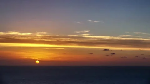 Time lapse timelapse of clouds crossing the sky at sunset Stock Footage 65175112