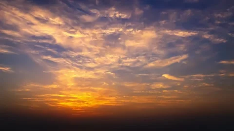 Time lapse timelapse of clouds crossing the sky at sunset Stock Footage 65175129