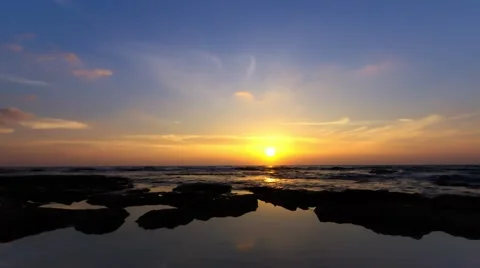 Time lapse timelapse of clouds crossing the sky at sunset Stock Footage 65175145