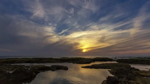 Time lapse timelapse of clouds crossing the sky at sunset Stock Footage 65175164