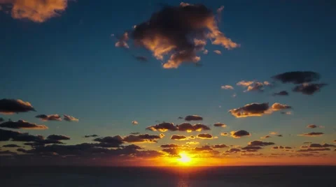Time lapse timelapse of clouds crossing the sky at sunset Stock Footage 65175165