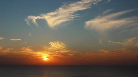 Time lapse timelapse of clouds crossing the sky at sunset Stock Footage 65175173