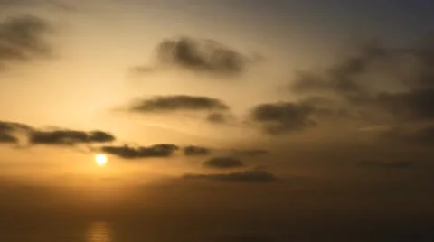 Time lapse timelapse of clouds crossing the sky at sunset Stock Footage 65175921