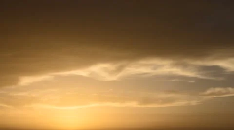Time lapse timelapse of clouds crossing the sky at sunset Stock Footage 65176091