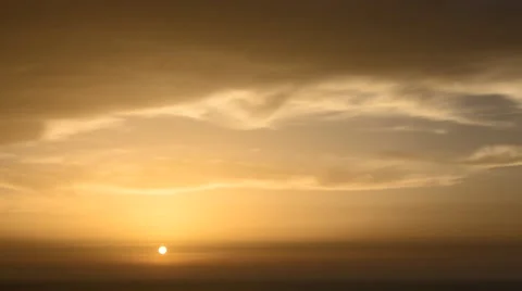 Time lapse timelapse of clouds crossing the sky at sunset Stock Footage 65176095