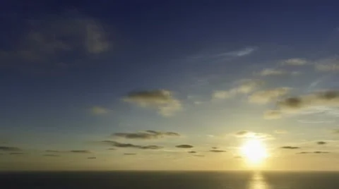 Time lapse timelapse of clouds crossing the sky at sunset Stock Footage 65176278