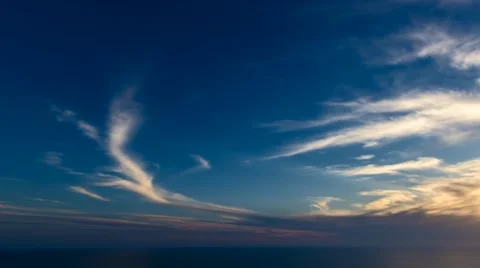 Time lapse timelapse of clouds crossing the sky at sunset Stock Footage 65176356