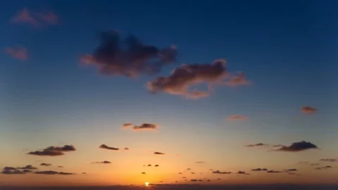 Time lapse timelapse of clouds crossing the sky at sunset Stock Footage 69826083
