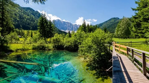 Time lapse (timelapse) - A small lake in the mountains / Alps Stock Footage 99351797