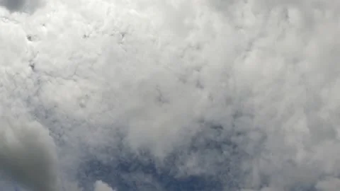 Time lapse, timelapse video of clear blue sky white fluffy clouds Stock Footage 144236668