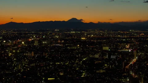 Time-lapse of Tokyo Nightscape and Mount Fuji from the Tokyo Metropolitan Video stock 327604051