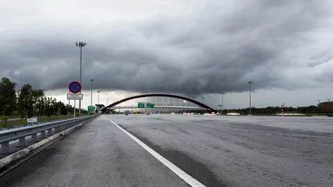 Time lapse toll users during heavy rains coming at 2nd Bridge, Penang, Malaysia. Stock Footage 97760249