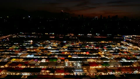Time lapse top view of busy street food at railway night market in Thailand Stock Footage 133334855