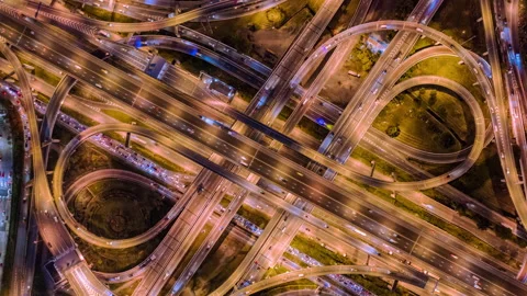 Time lapse, top view of traffic on a roundabout road at night Vídeos de archivo 222551443