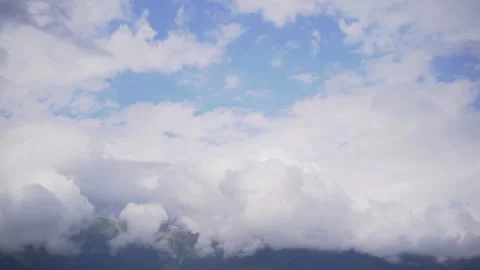 Time lapse tops mountains in large clouds. Cloudy peak Stock Footage 169571857