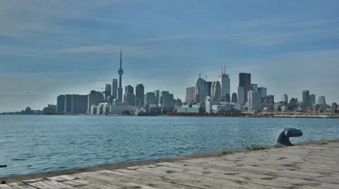 Time Lapse of the Toronto Skyline Overlooking the docks of Lake Ontario Stock Footage 64975037