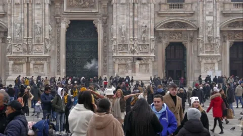 Time Lapse of Tourists get fun in Milan Duomo, 4k  Long Shot Stock Footage 228739578