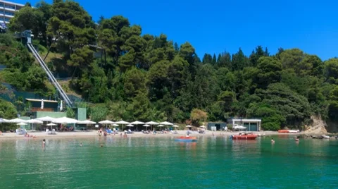 Time-lapse: tourists on typical Corfu beach,  Greece Stock Footage 8511658