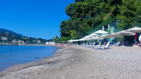 Time-lapse: tourists on typical Corfu beach,  Greece Stock Footage 8511714