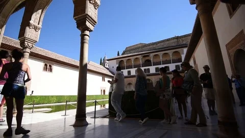 Time lapse of tourists walking through the Andualcia Alhambra Stock Footage 74480636