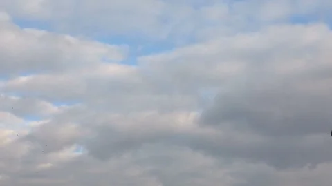 Time lapse of the tower crane at the construction site against the blue sky Stock Footage 103338928