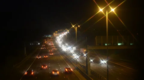 Time lapse of traffic on A1/M motorway at night, UK Stock Footage 33786170